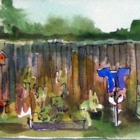 long fence with Peter Rabbit story decorations
