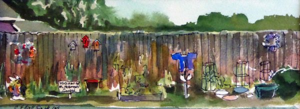 long fence with Peter Rabbit story decorations